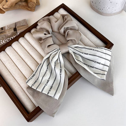fashion-gallery-elastic-band-with-satin-bow-random-colors
